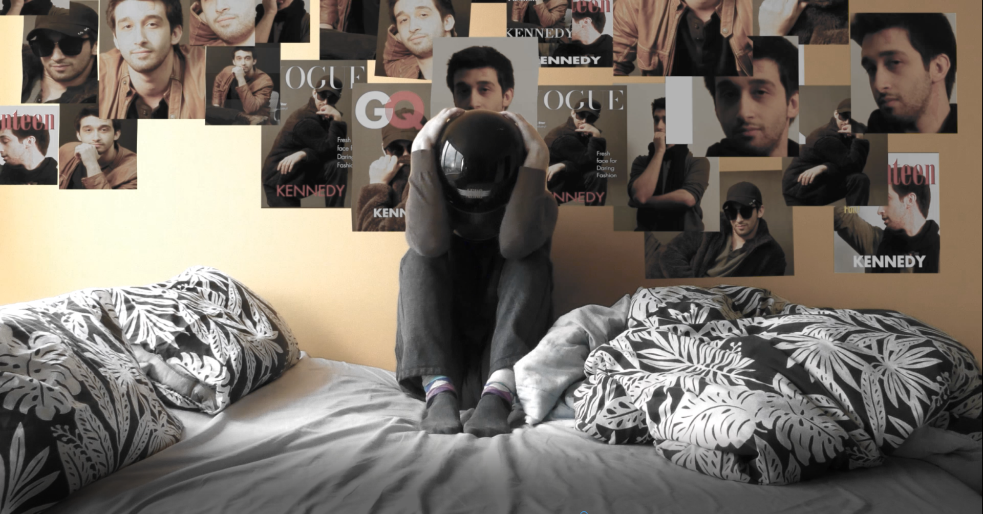 A shot from the finished film with the actor rotoscoped after placing the posters in the background